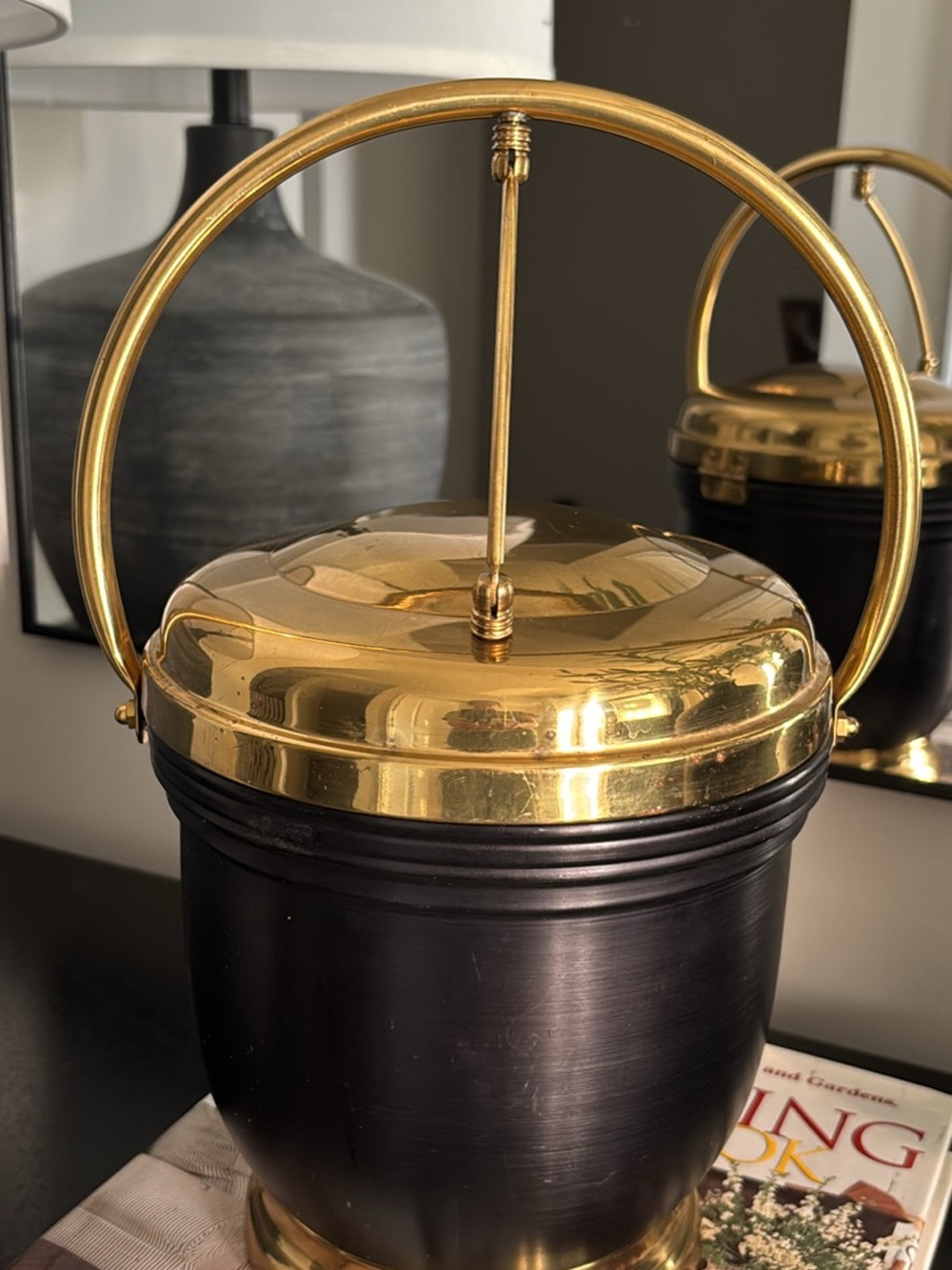 Brass-Accented Black Ice Bucket with Handle Ice tongs included.